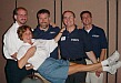 7-27-02 Bob Savarese, Bob Beodeker, Glenn George, and Larry Marino lift Annie Miller Savarese